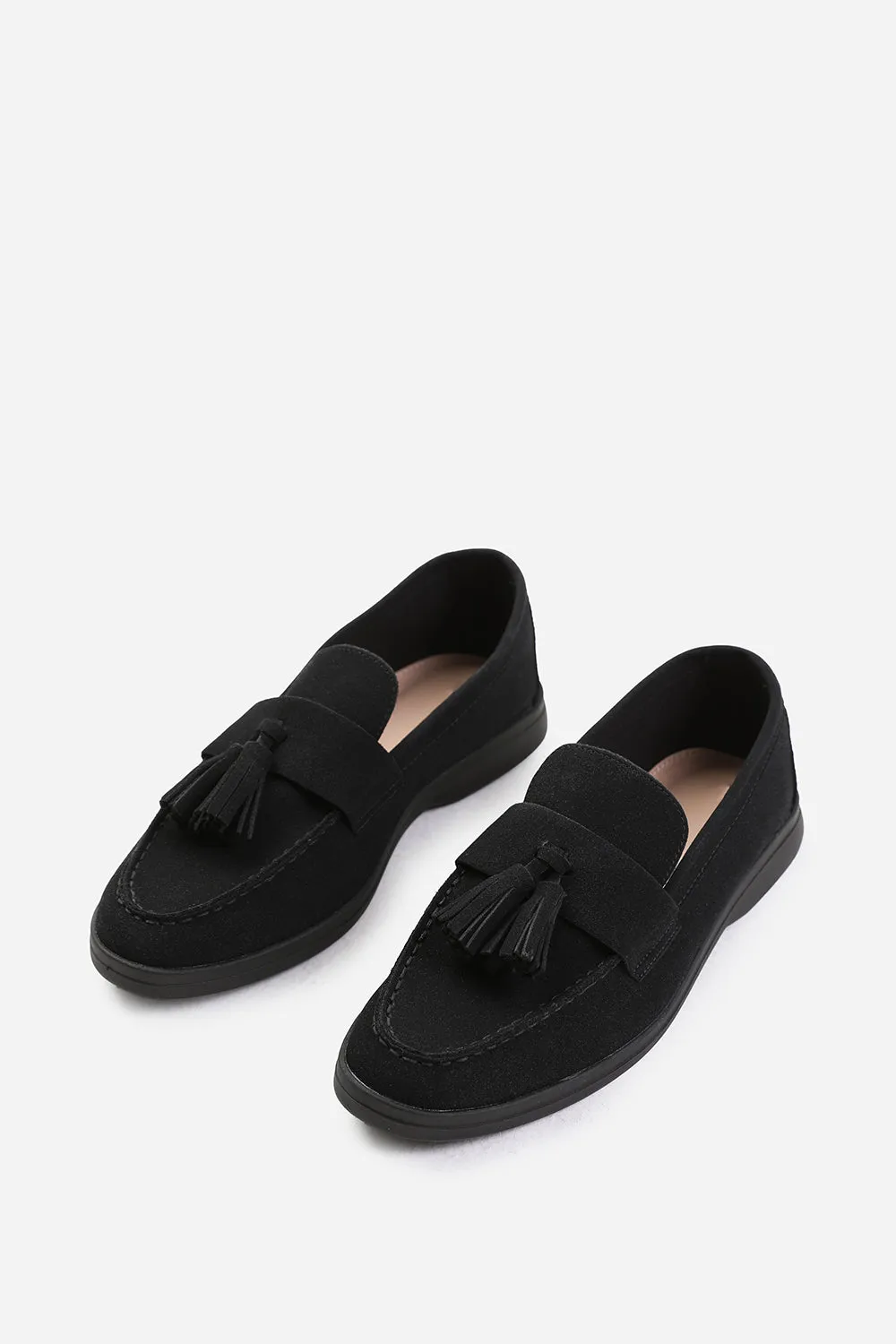 KENYA SLIP ON LOAFER WITH TASSEL DETAILING IN BLACK SUEDE