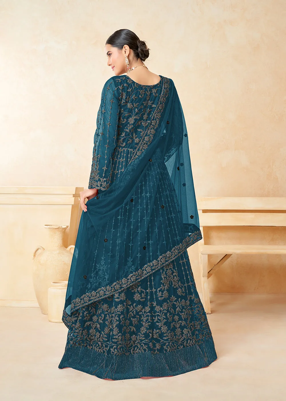 Tempting Teal Blue Net Wedding Wear Anarkali Dress